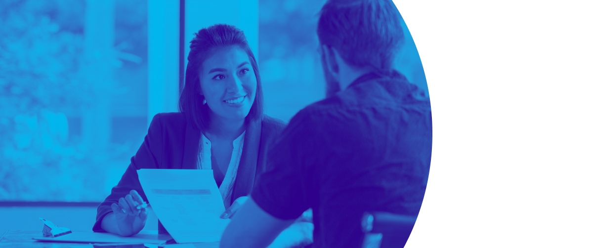 Two people in a business meeting.